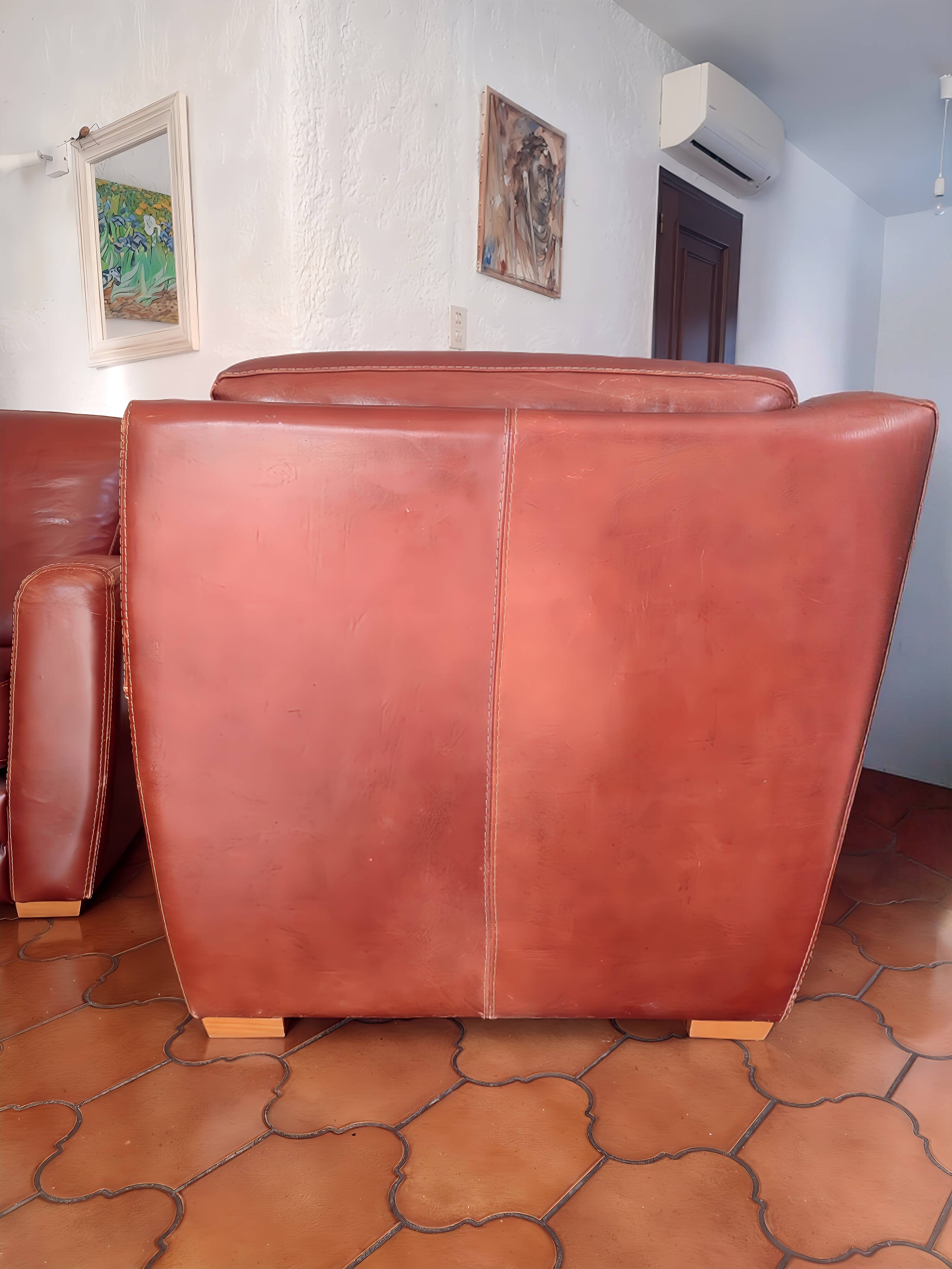 Genuine leather club chairs by Nicoletti, like new.