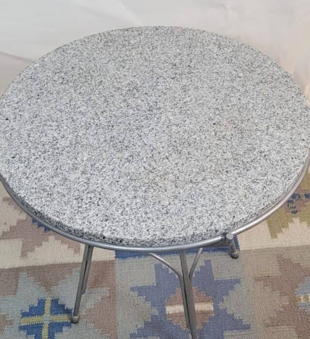Round coffee table in grey granite and silver metal, German design 1960.
