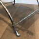 Curule stool in silver steel neoclassical style with swan heads