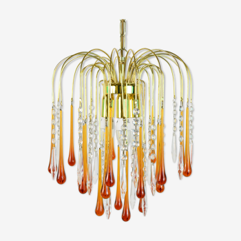 A pair of Mid Century 70's waterfall chandeliers. Murano glass amber drops. Paolo Venini style.