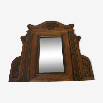 Old pediment mirror carved in wood