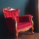 Baroque style carved wooden armchair in burgundy red velvet