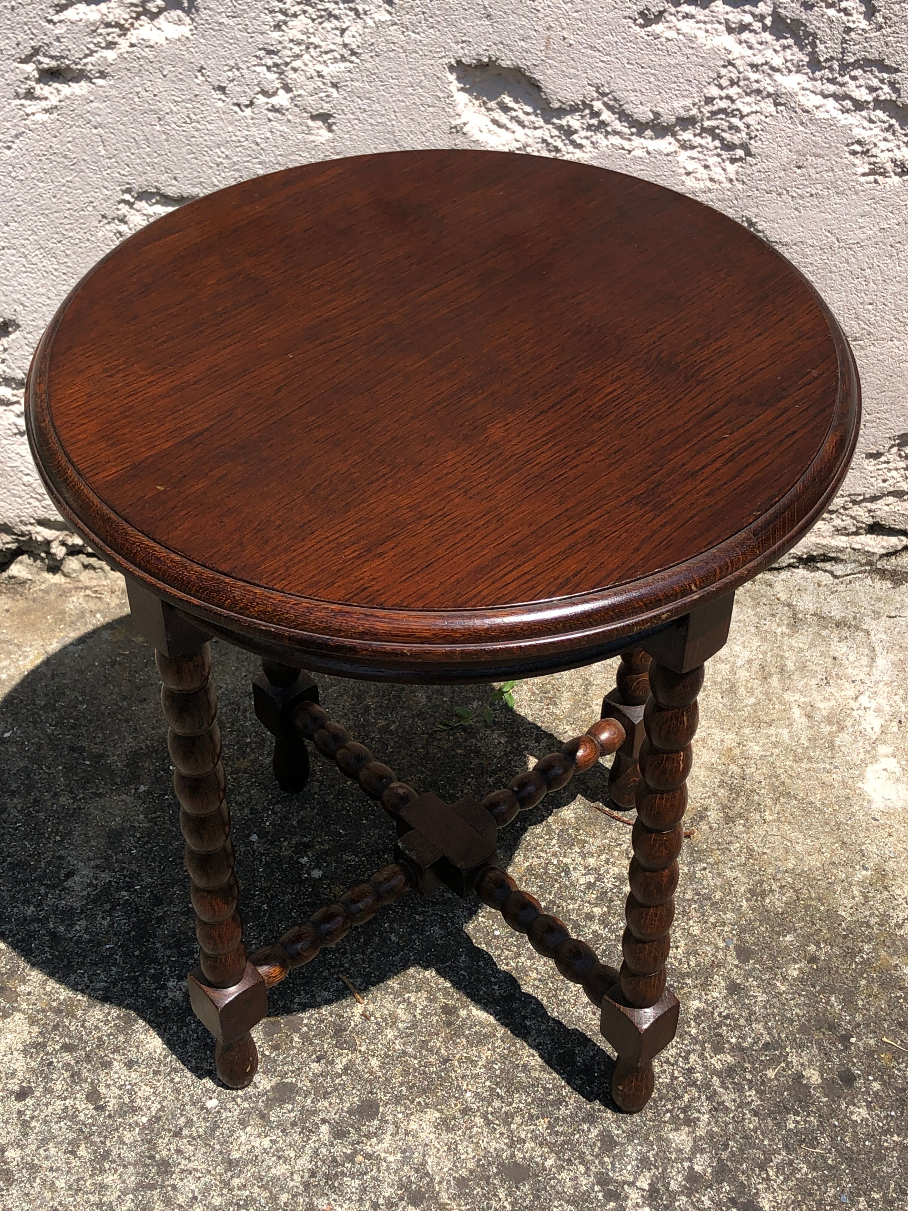 Dark turned wood side table