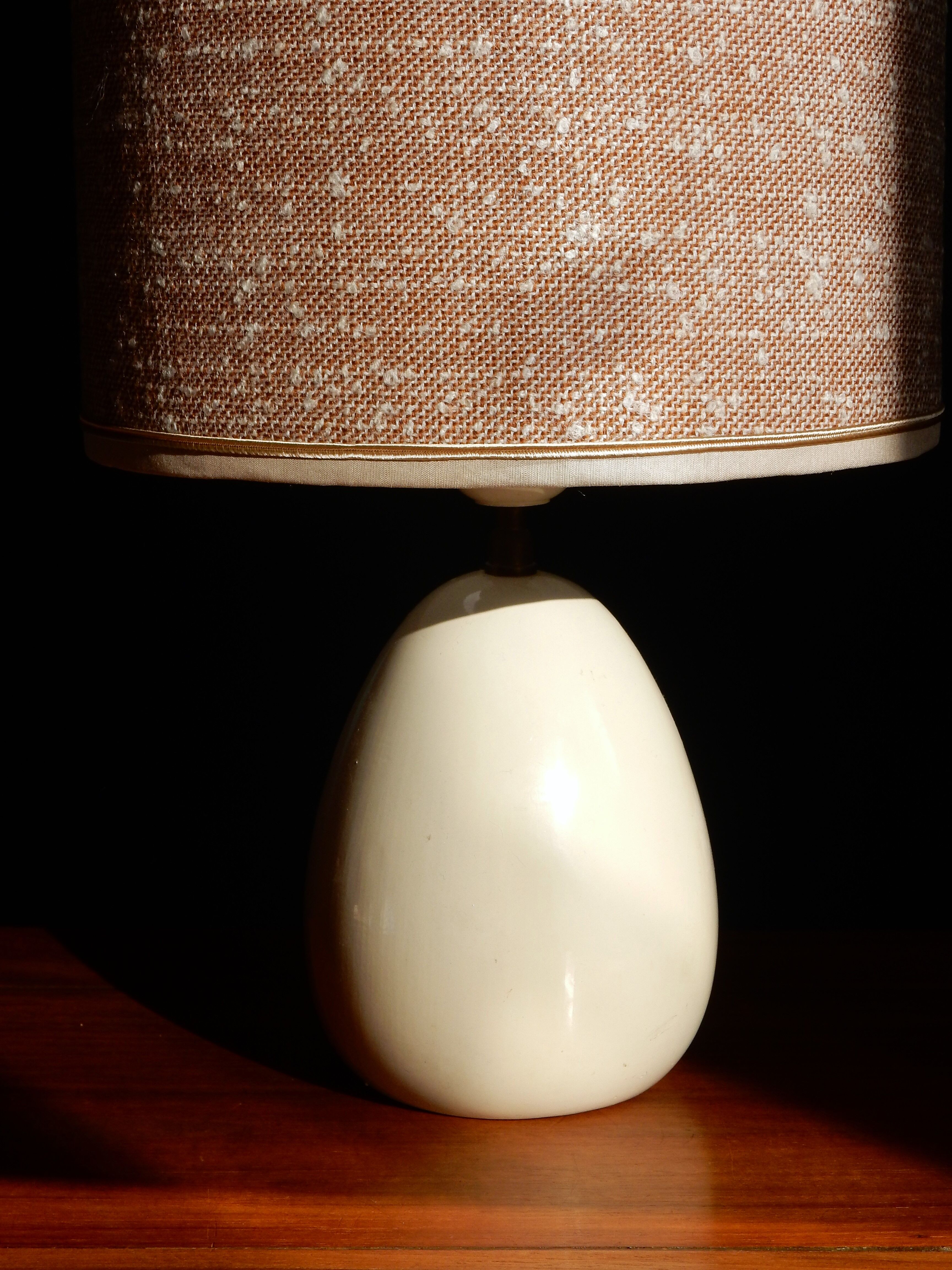 Table lamp in wool tweed and foot in cream color wood