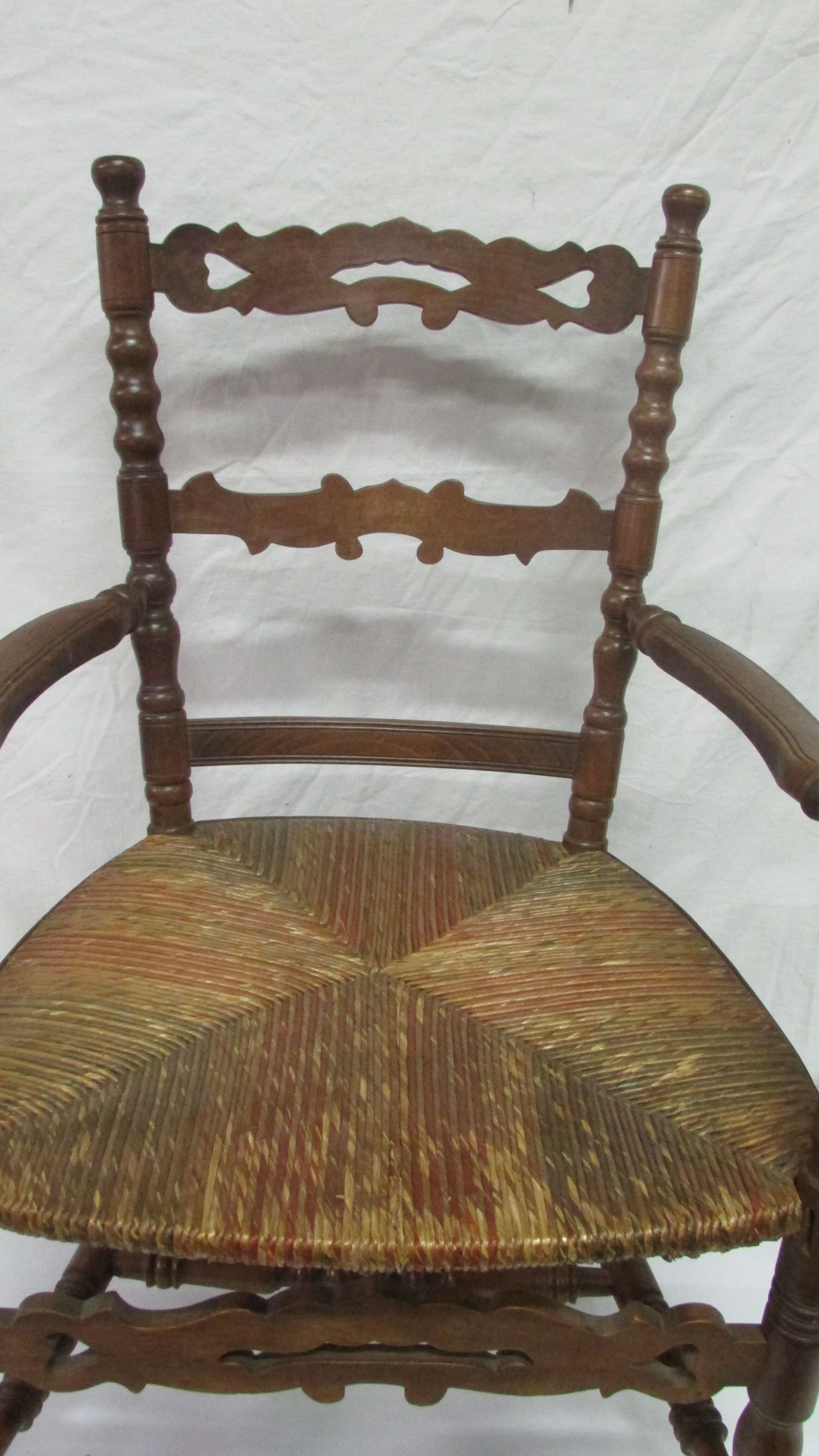 Antique armchair with armrests