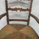 Antique armchair with armrests