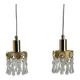 Two gold-plated brass and crystal pendant lights, by Palwa, 1960s design, Hollywood Regency.