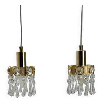 Two gold-plated brass and crystal pendant lights, by Palwa, 1960s design, Hollywood Regency.