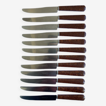 12 table knives stainless steel blade round ends / Bakelite handles with wood burl effect / 1950s