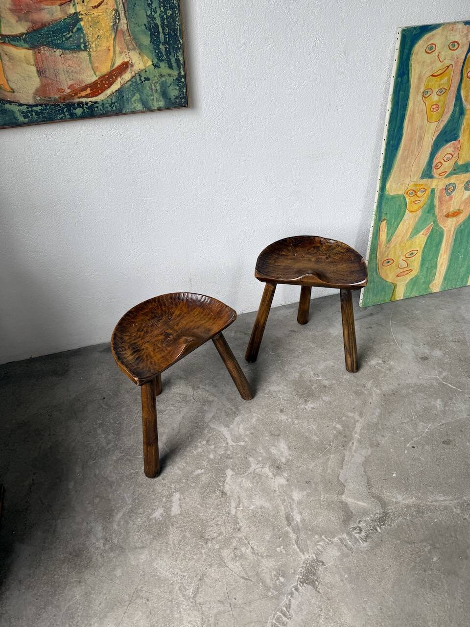 Pair of Le Selou tripod shepherd's stools