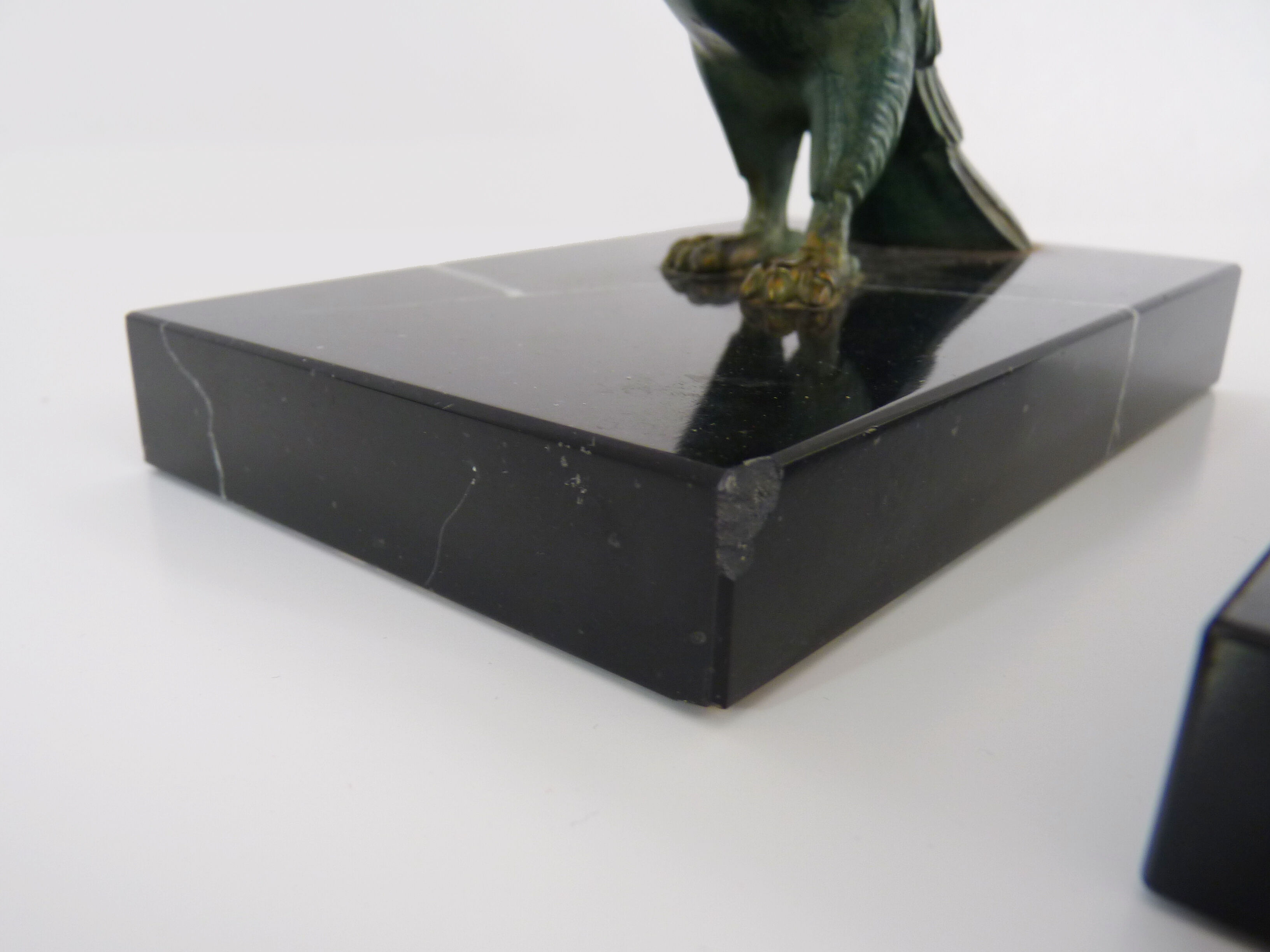 Pair of art deco eagle bookbands in marble and regulates, eagle bookbands. Year 30