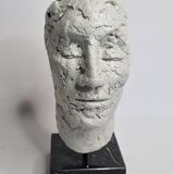 Clay sculpted head on marble base, 32 cm