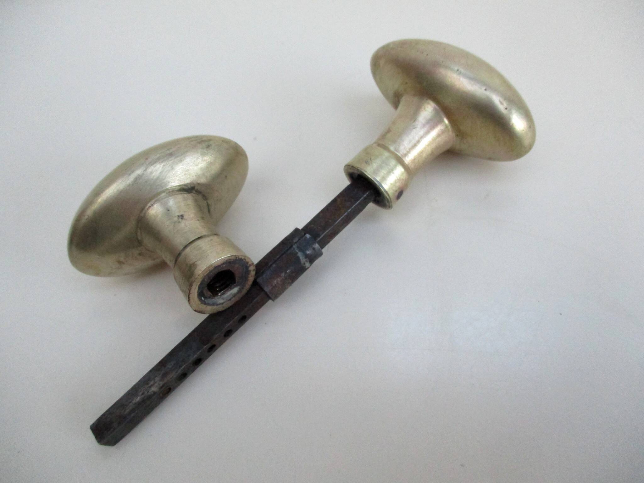 Antique oval brass door handles