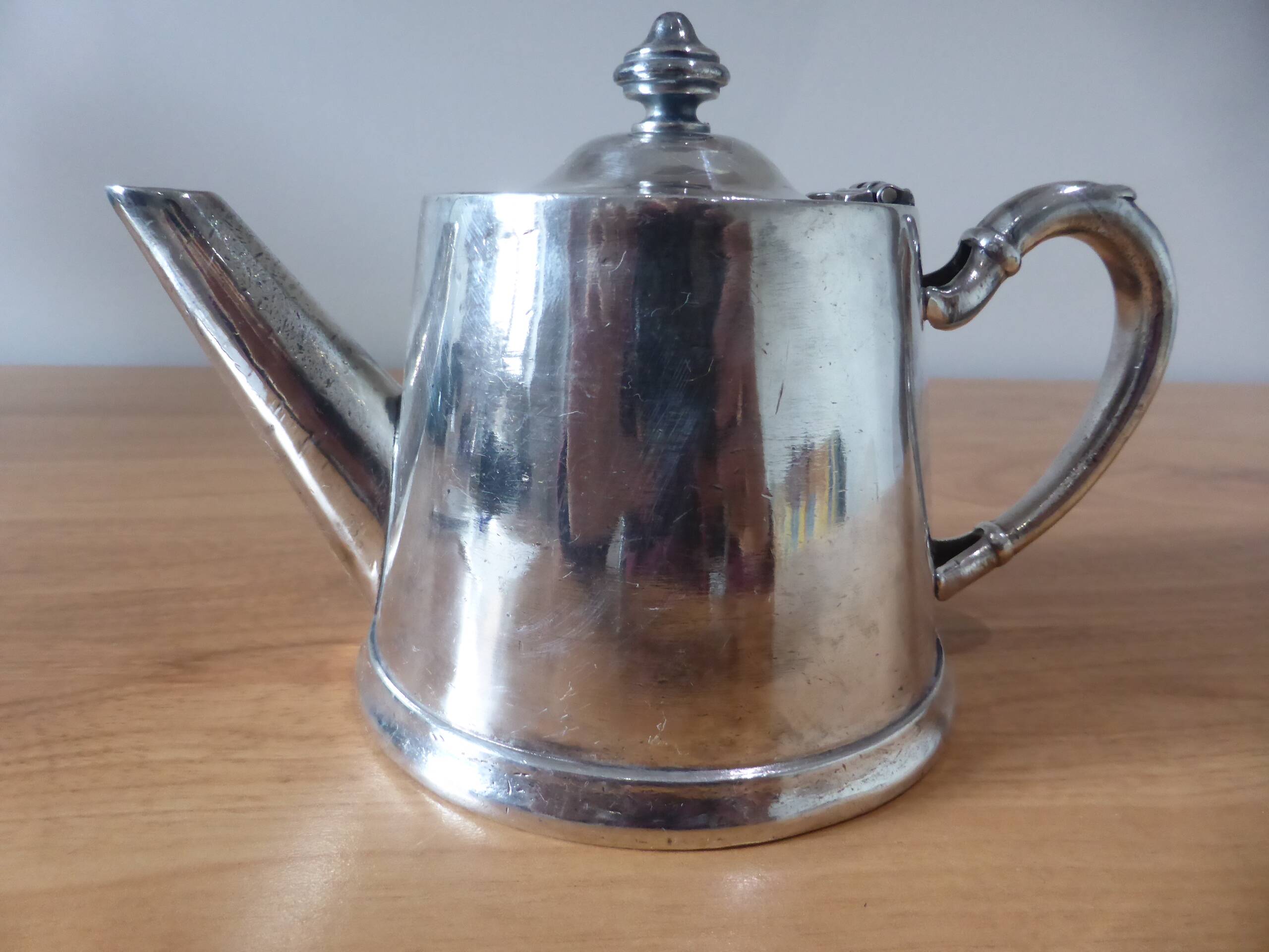 Vintage silver-plated metal teapot, pottery style