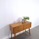 Vintage teak Danish chest of drawers with high slanted legs, side table, sideboard.