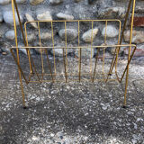 Golden magazine holder