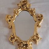 Wooden and gilded mirror with gold leaf