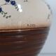 Globular ceramic vase by L. Dage, hand-painted floral decoration, style