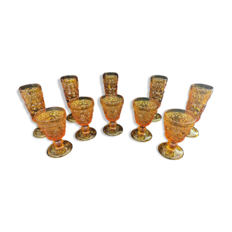 Set of stemmed glasses and amber flutes year 70