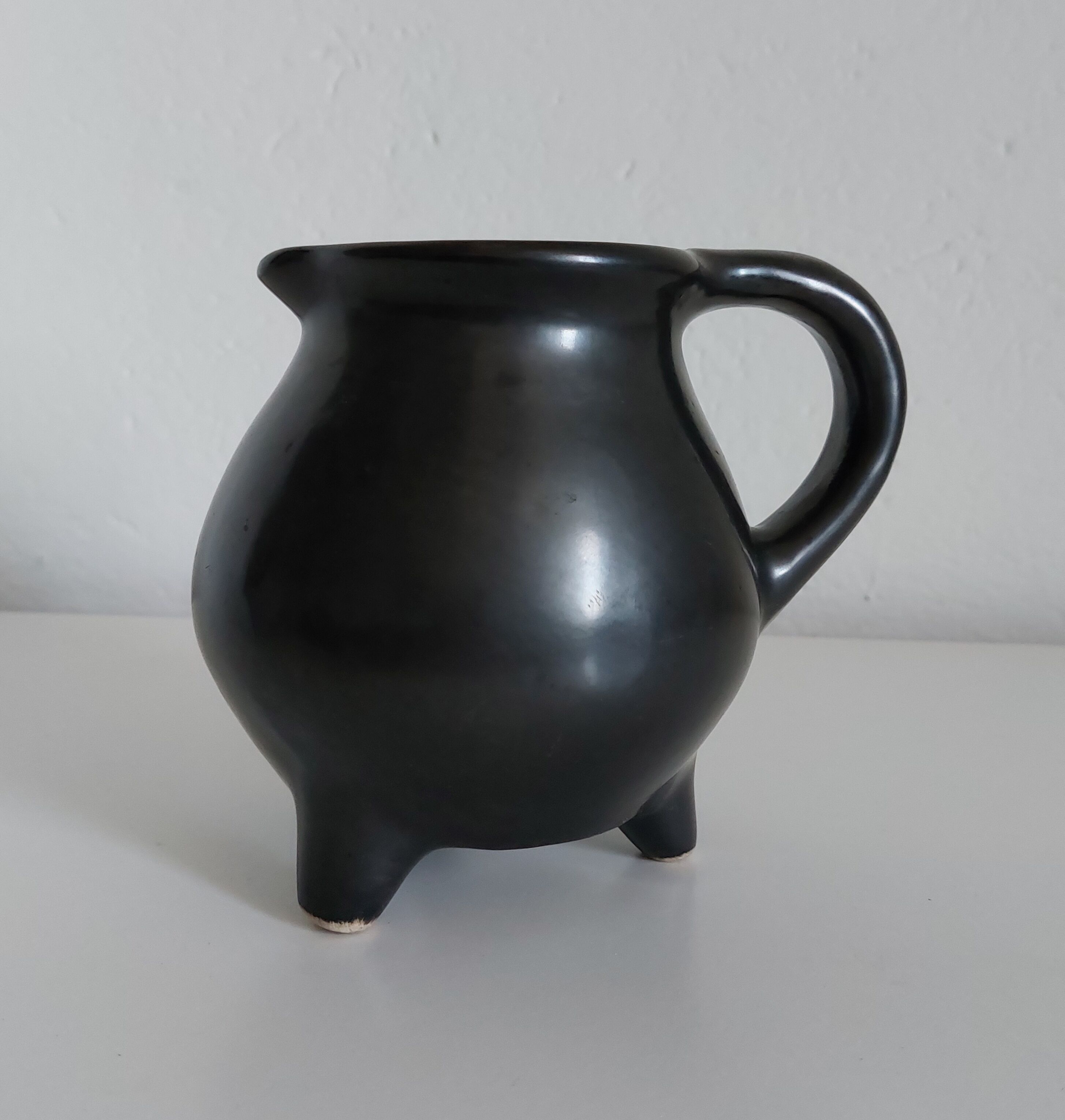 Vintage satin black tripod vase