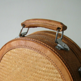 Round woven wicker and leather case