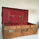 suitcase of leather with labels of palaces