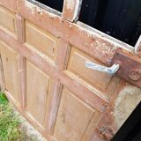Ancient paneled solid oak door with 3 windows