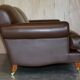 Contemporary Howard & Sons style grand sofa with brass casters.