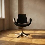 Alipes black swivel salon chair with chrome star base by Giorgetto Giugiaro