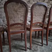Set of 6 antique Louis XVI style dining chairs with caning.