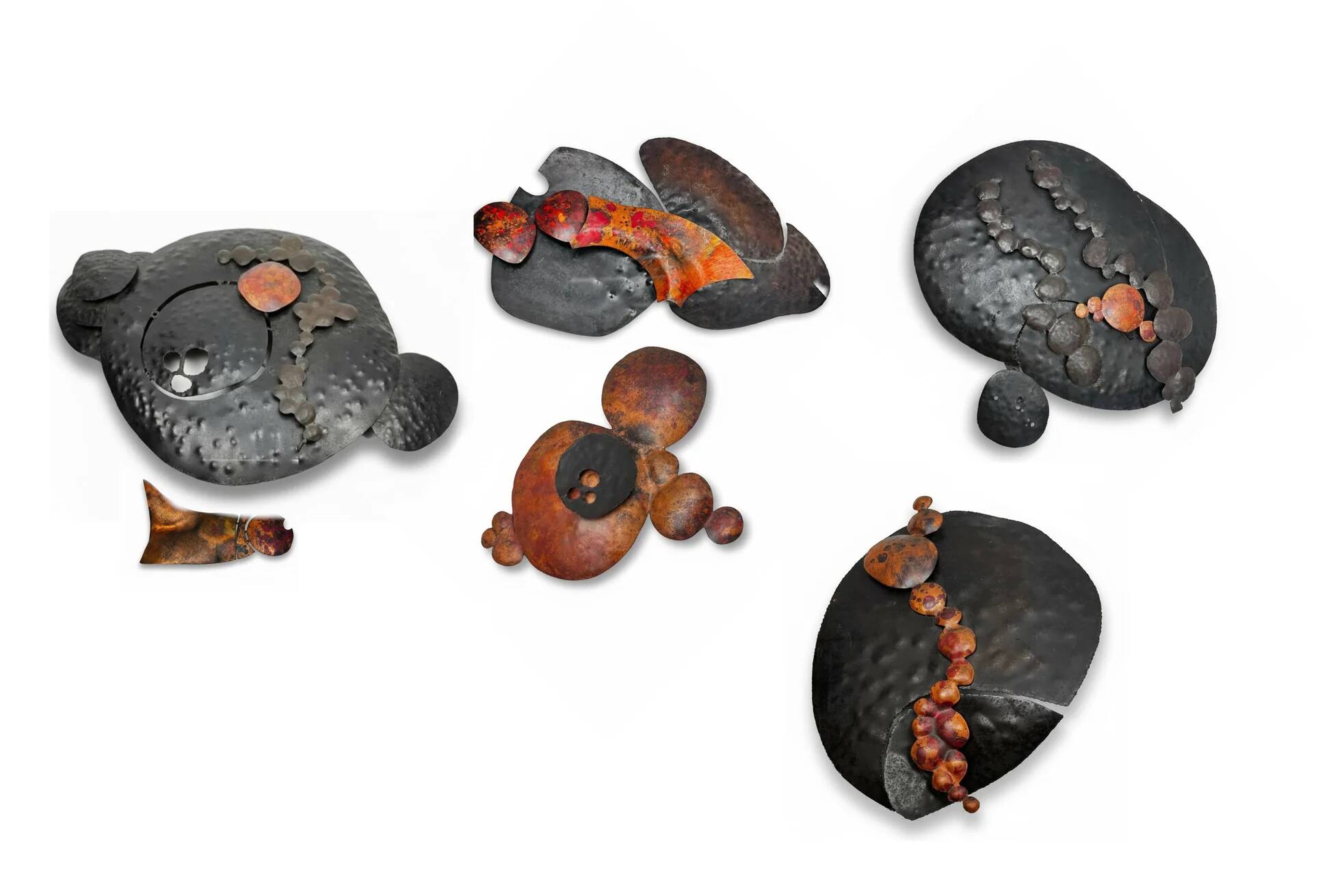 Set of brutalist wall sculptures signed B + D, circa 1965–1975.