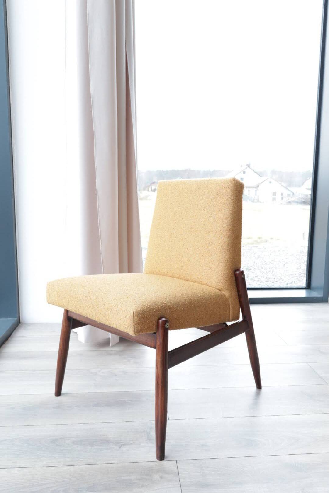 Yellow vintage lounge chair armrests boucle upholstery, walnut wood, Scandi