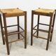 Pair of 80 cm high straw and beech bar stools