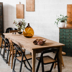 Folding black cannage chair