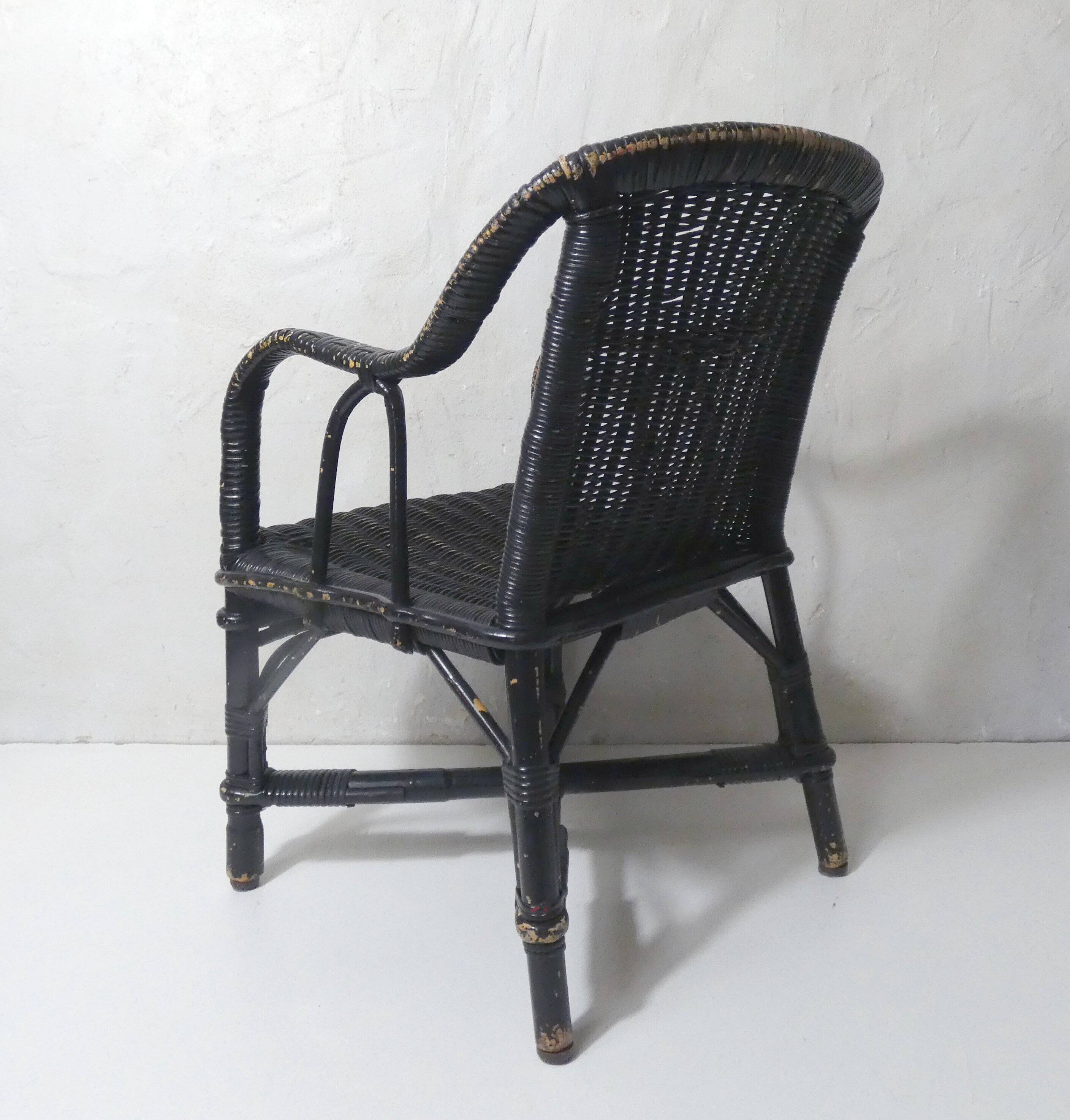 Vintage children's size rattan armchair