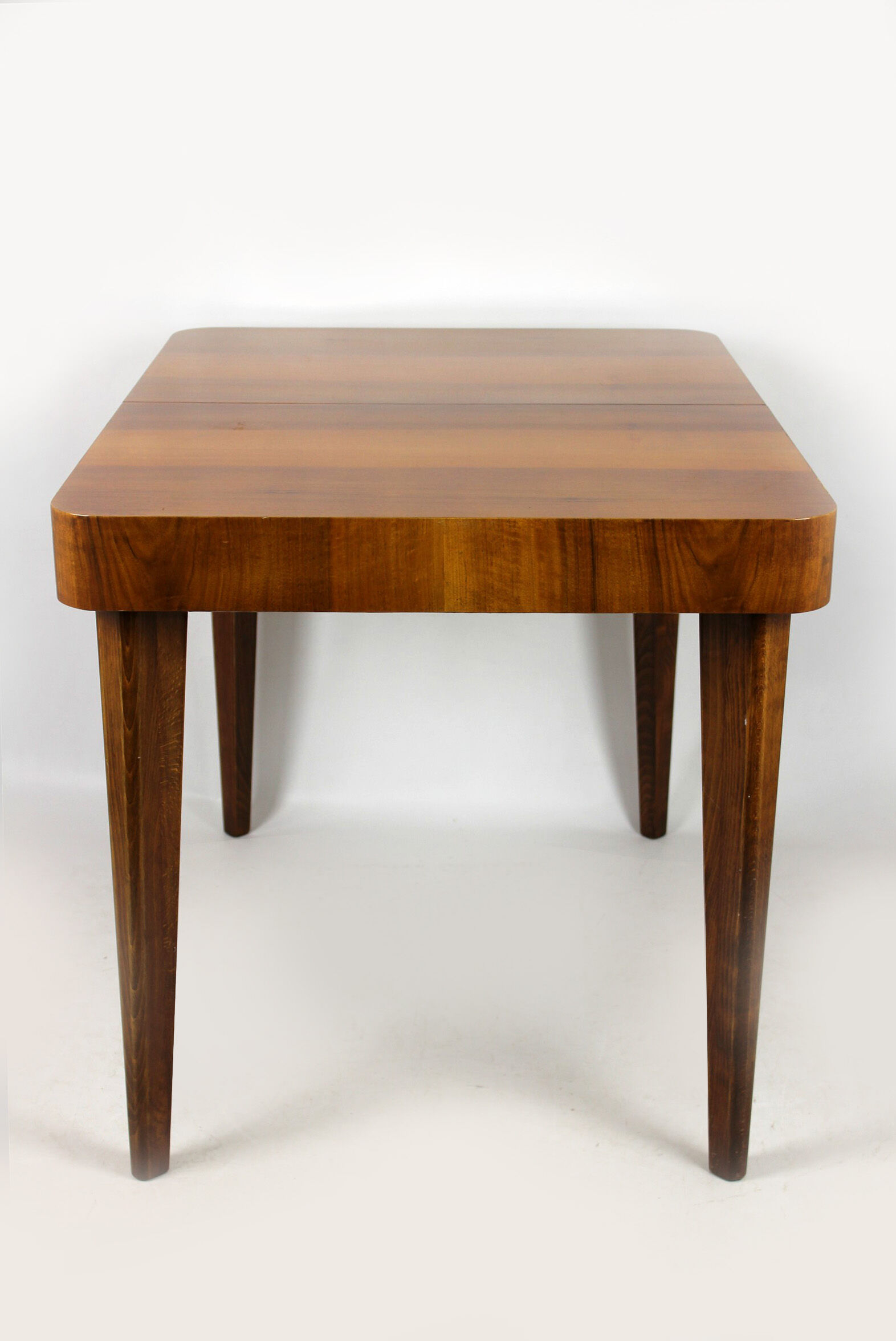 Walnut folding dining table by Jindrich Halabala for UP Zavody, 1940s