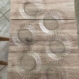 Duralex dessert plates in the shape of a daisy flower, transparent glass