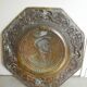 Offering dish in embossed brass by François I