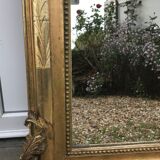 Mirror with a golden leaf pediment, 151x90cm