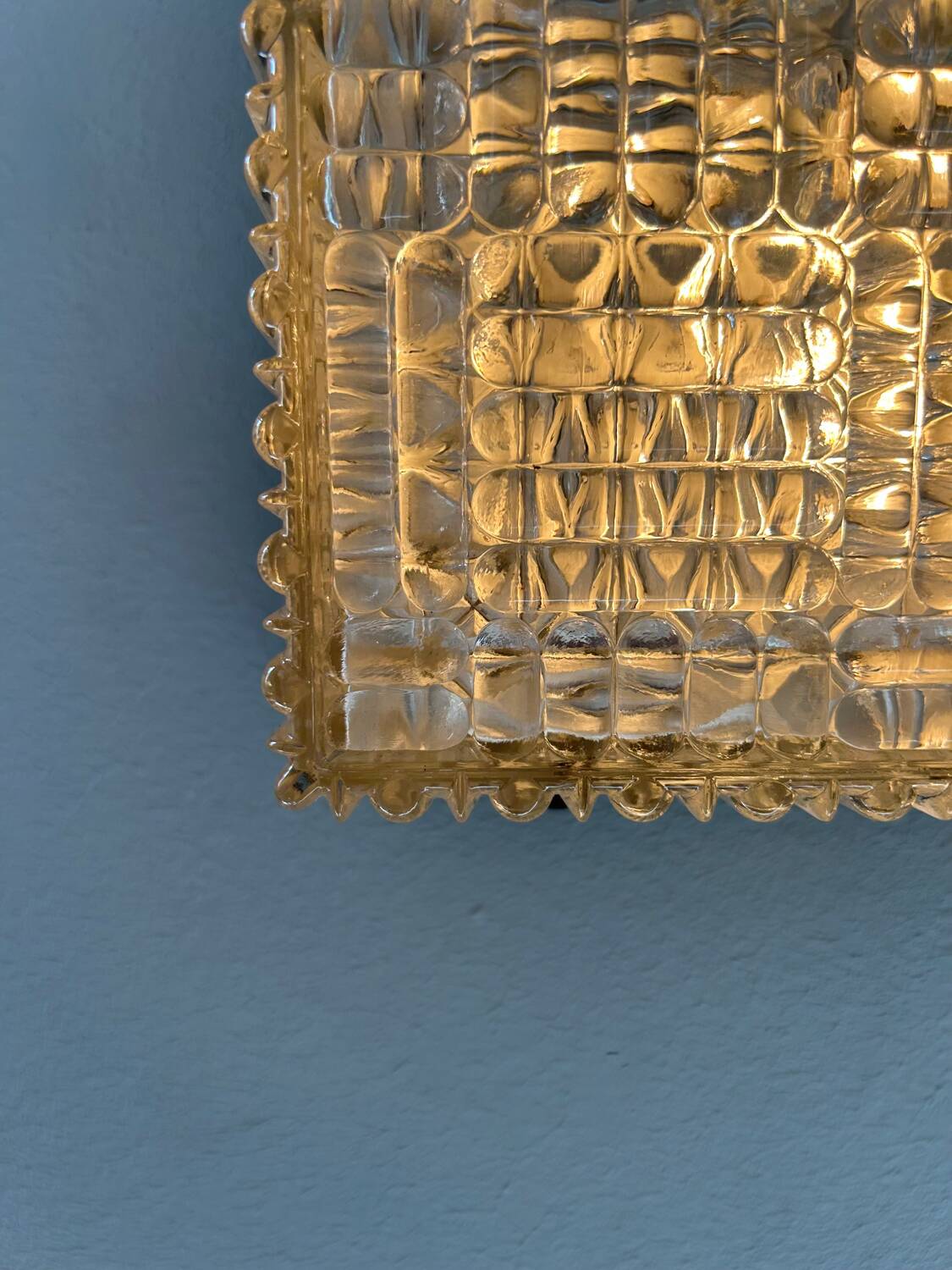 Vintage wall lamp in pressed molded glass, France 1970