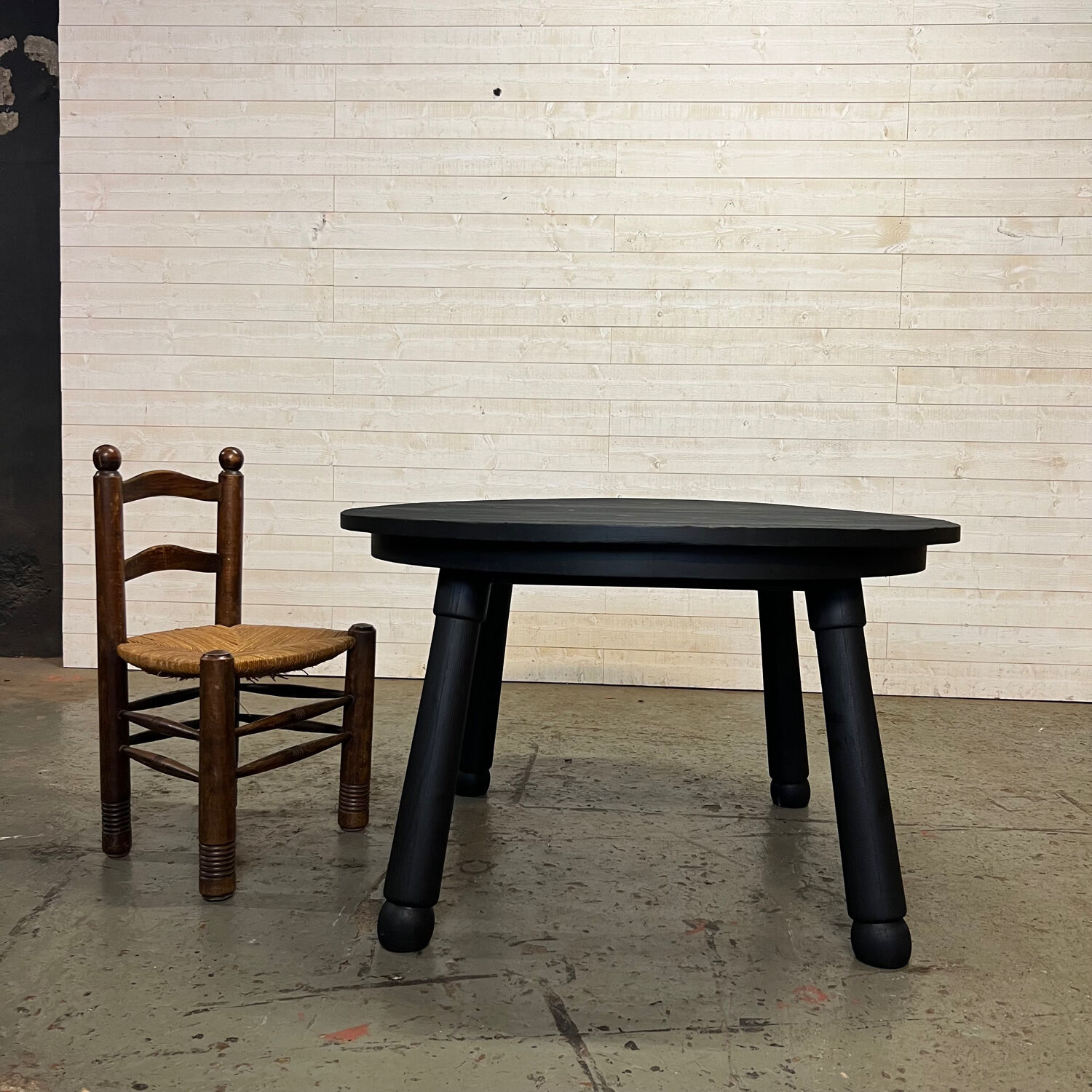 Brutalist round table in burnt wood yakisugi