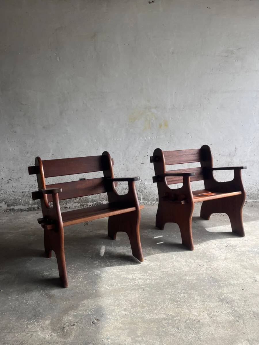Set of two dark brown solid wood brutalist sculptural chairs with carved details