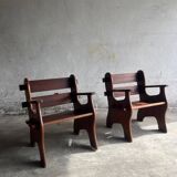 Set of two dark brown solid wood brutalist sculptural chairs with carved details