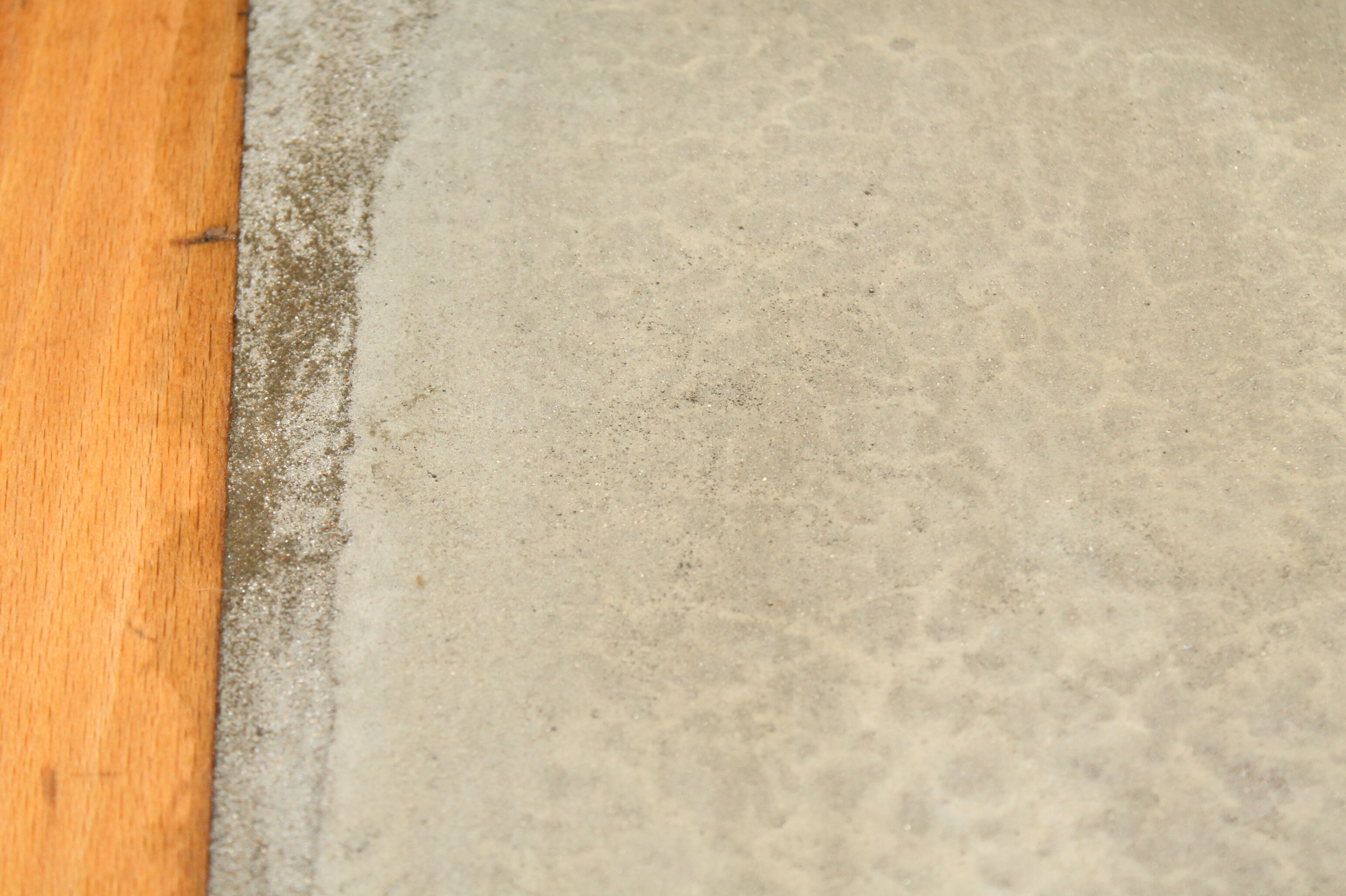 Waxed concrete top table