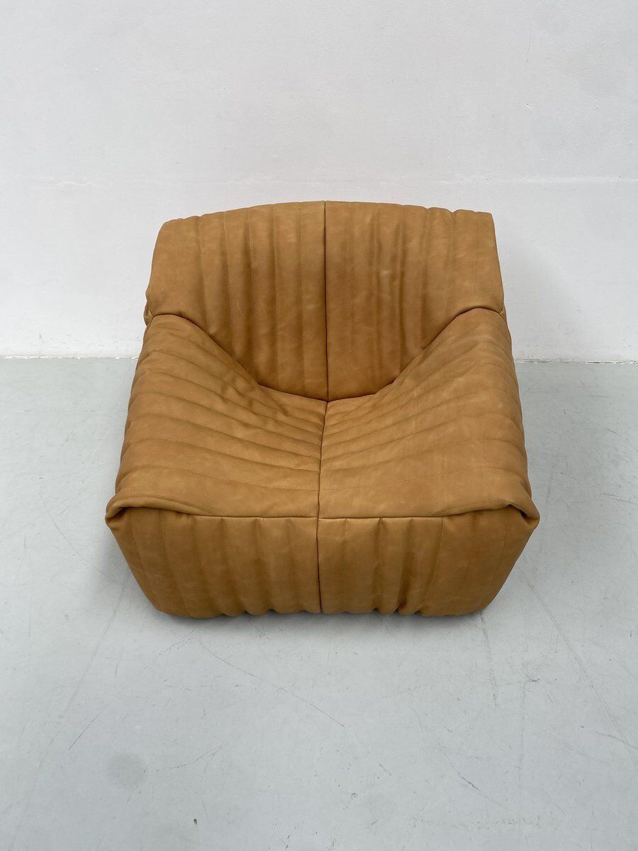 Sandra chair in camel leather by Annie Hiéronimus for Cinna/Ligne Roset.