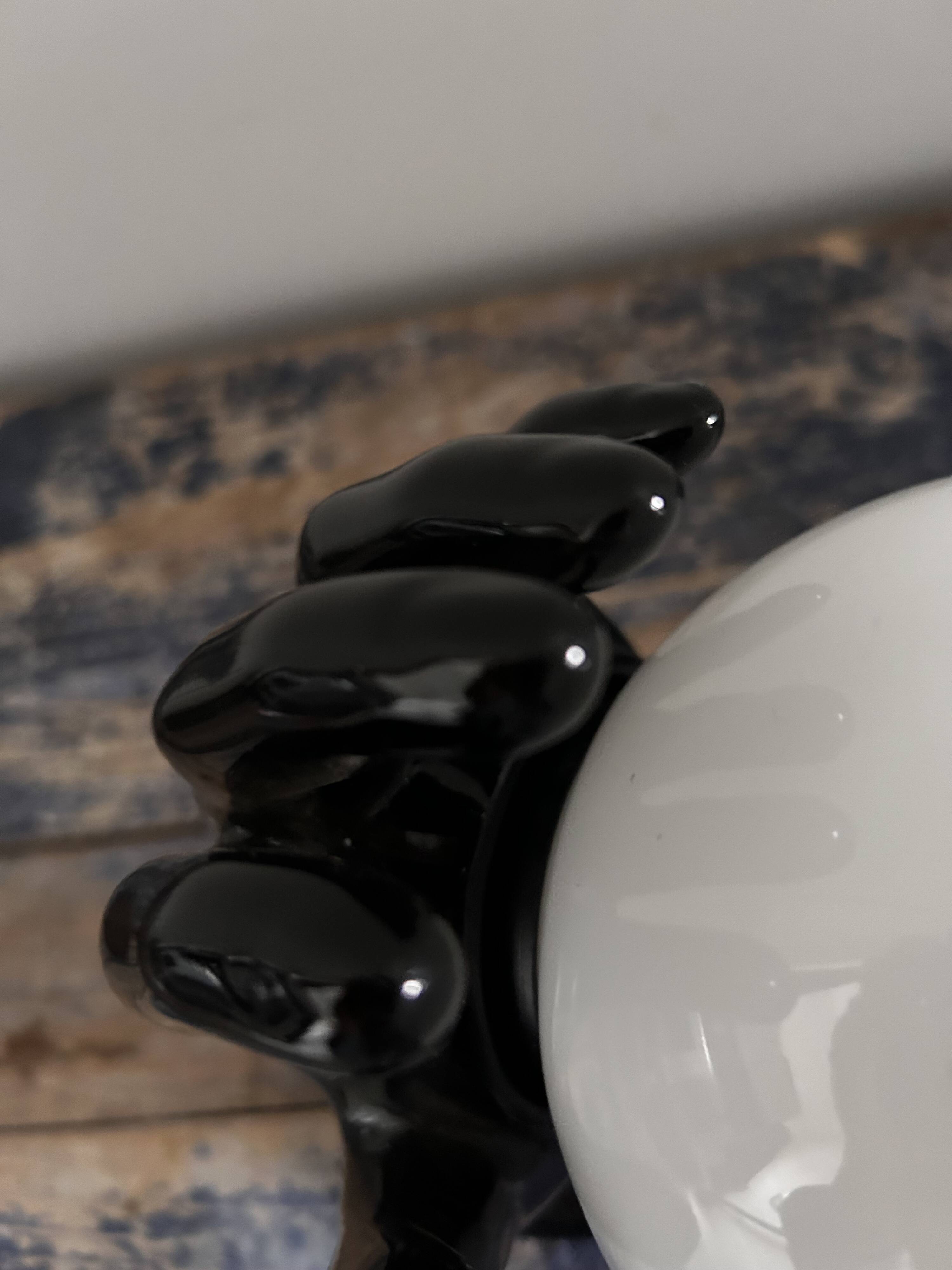 Handmade wall light in black and opaline ceramic