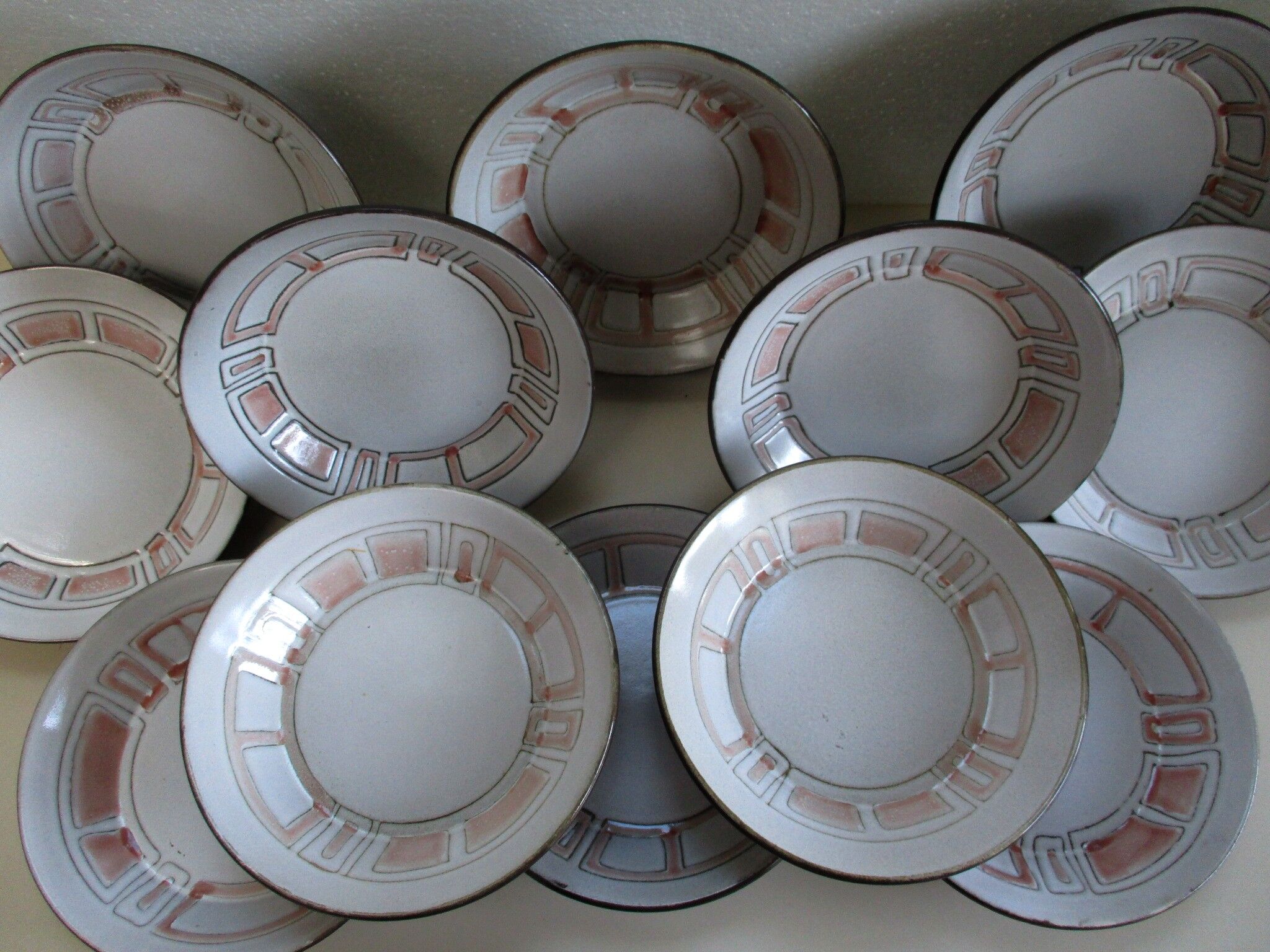 Set of 12 hollow plates in Niderviller stoneware
