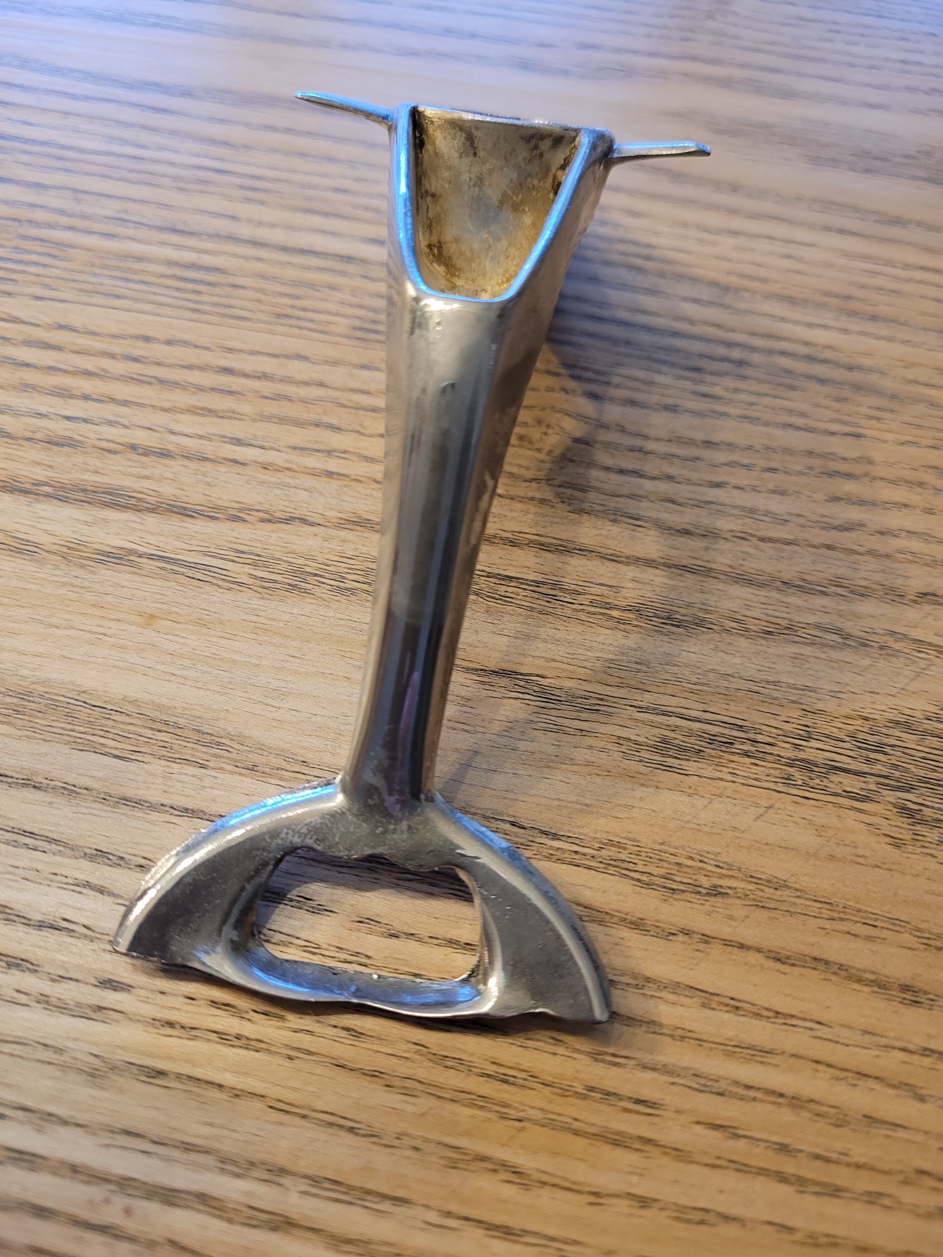 Silver dolphin bottle opener