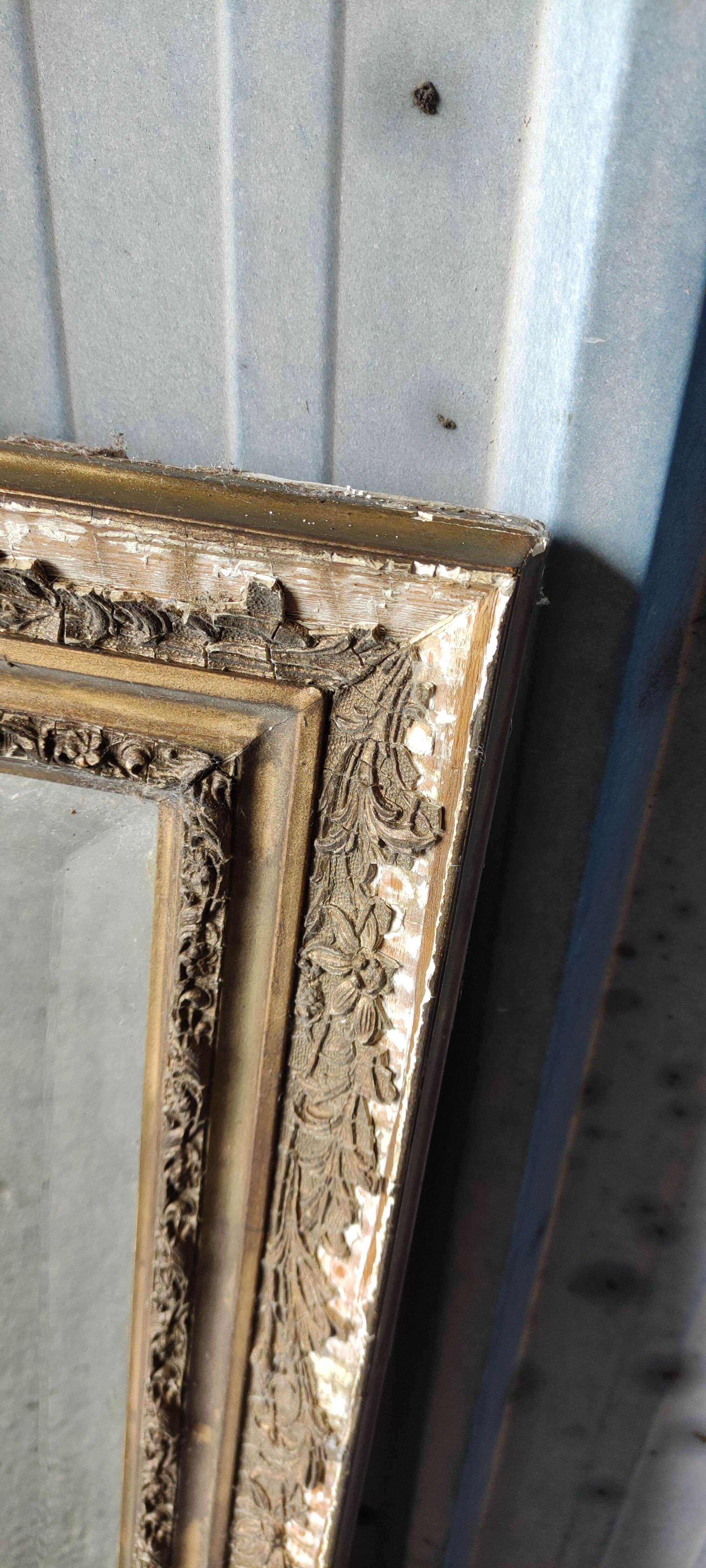 Old beveled mirror, faded castle decoration
