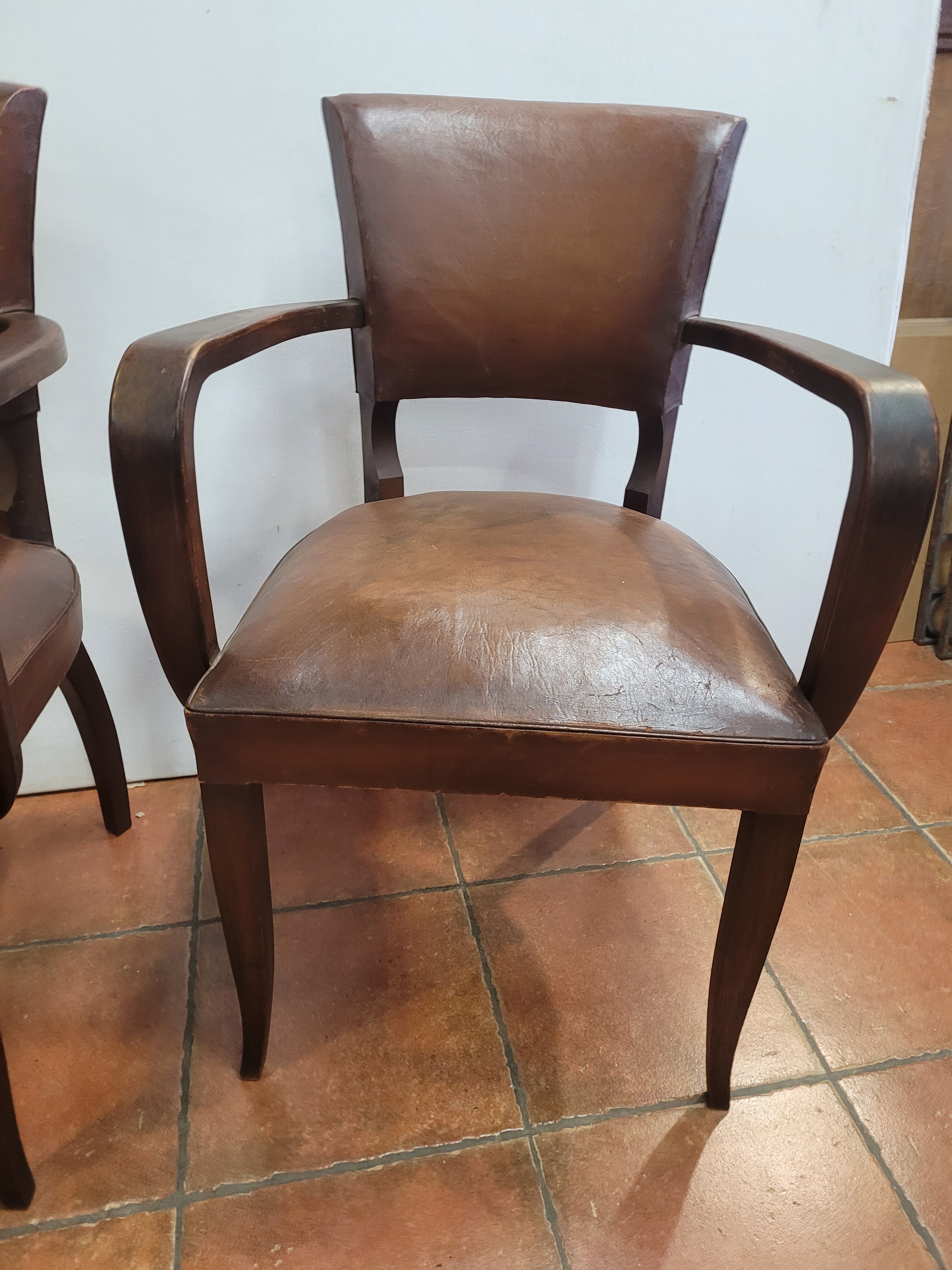 Paire de fauteuils bridge ancien en cuir